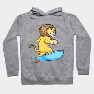 Lion as surfer on a surfboard Hoodie